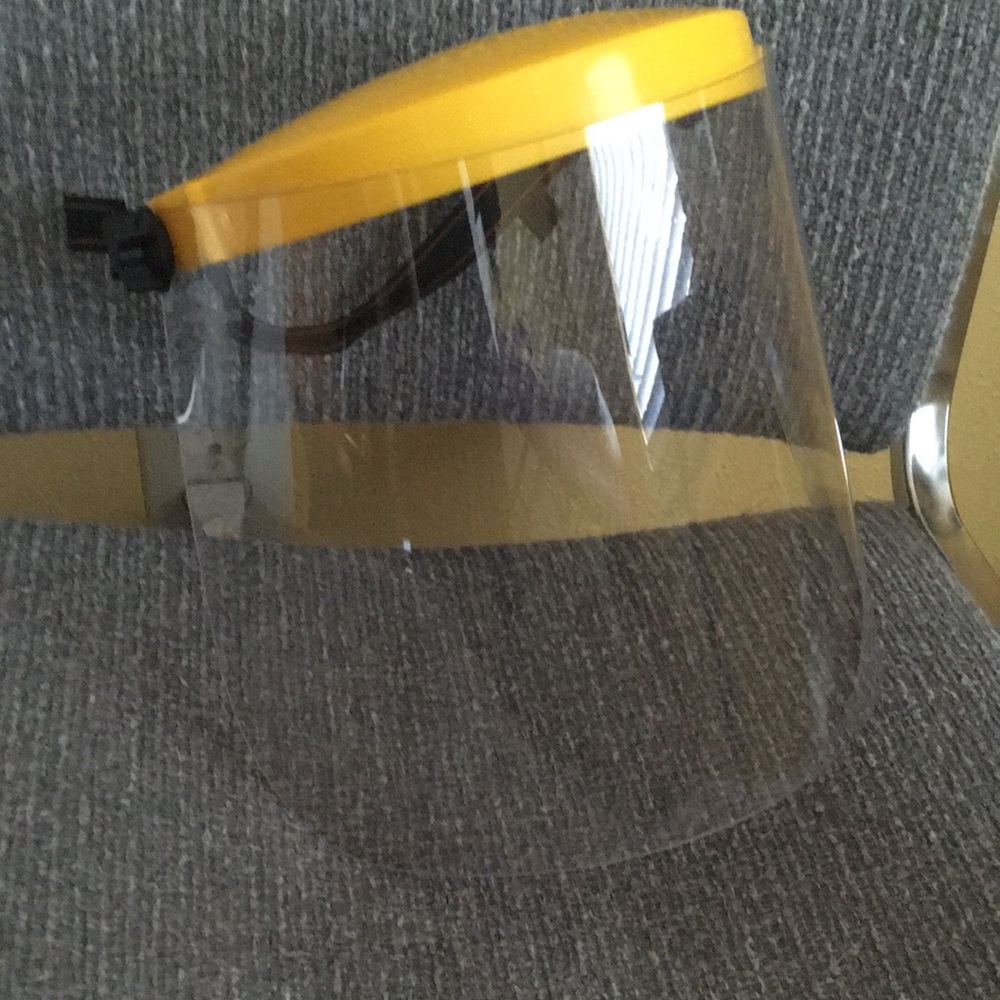 SOLD. NEW!Hard Plastic Face Shield. Flips up Glasses OK